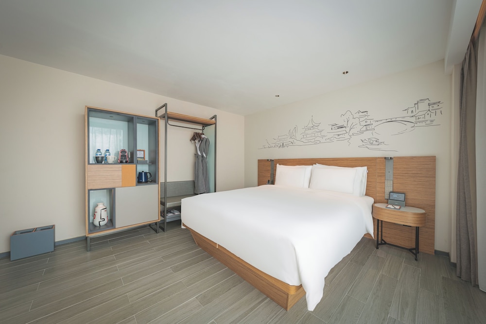 Executive Deluxe King del hotel UrCove by HYATT Nanjing Downtown. Foto 5