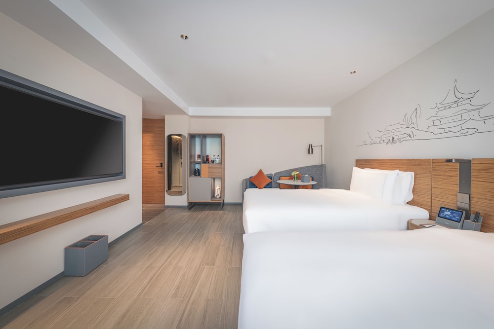 Business Deluxe Twin del hotel UrCove by HYATT Nanjing Downtown. Foto 3