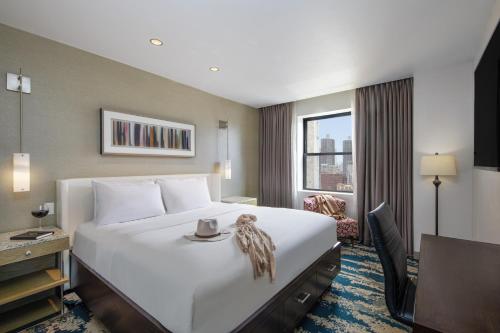 Habitación con cama extragrande. del hotel Felix River North/magnificent Mile. Foto 1