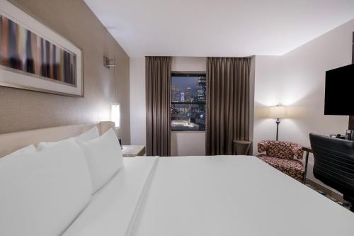 Habitación Deluxe con cama extragrande del hotel Felix River North/magnificent Mile. Foto 3