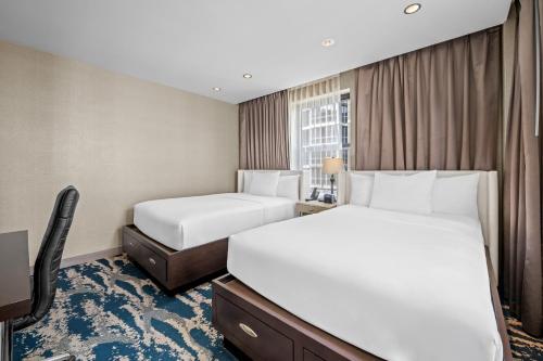 Habitación Doble Deluxe del hotel Felix River North/magnificent Mile. Foto 4