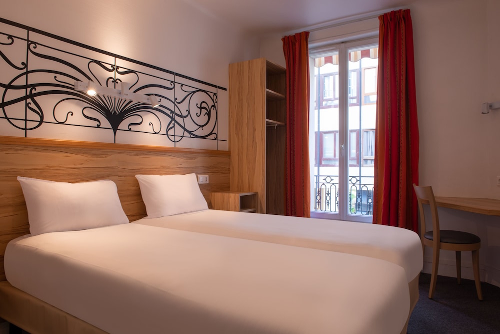 Habitación estándar con 2 camas individuales del hotel Pacific. Foto 1