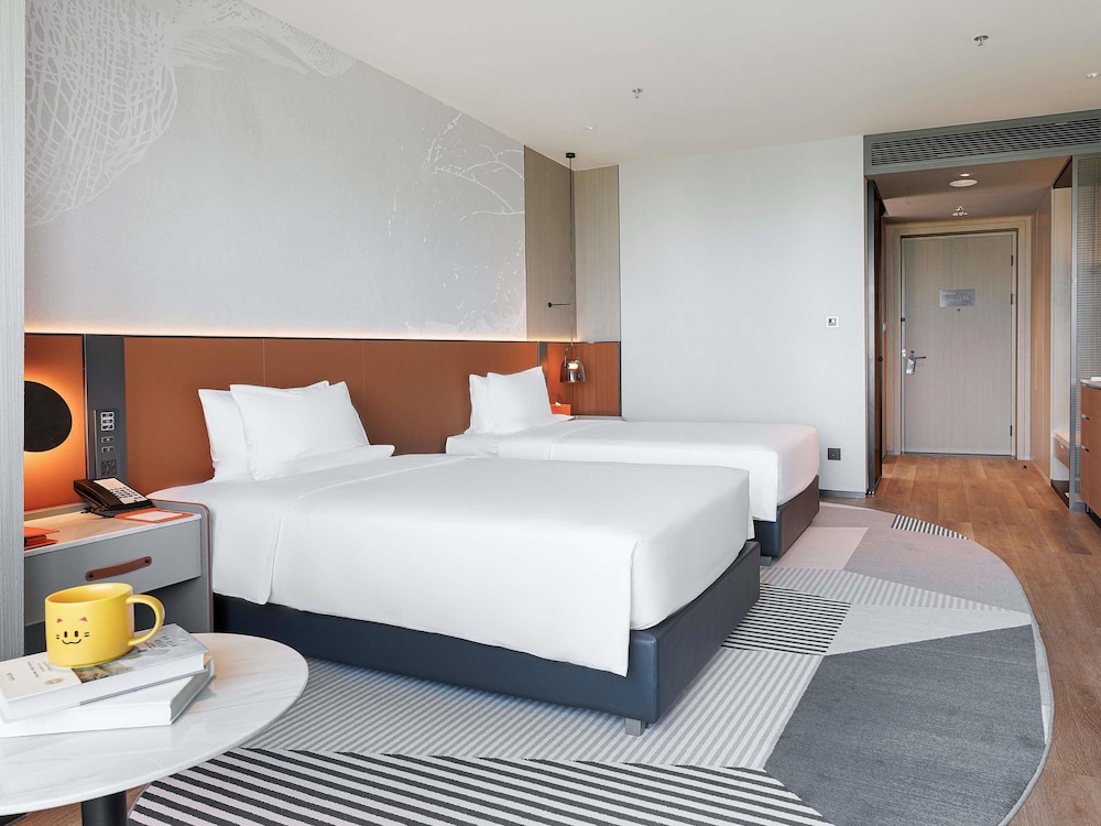 Habitación Deluxe, 2 camas individuales del hotel Novotel Xi'an Aden. Foto 1