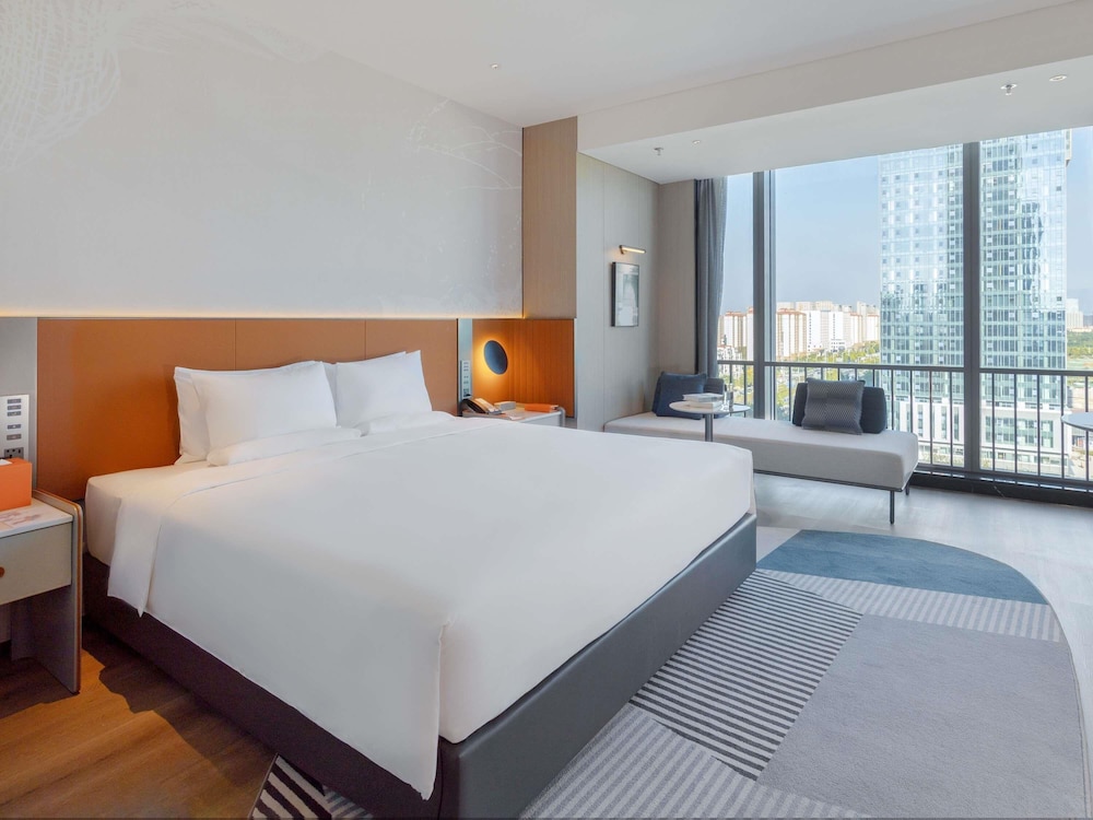 Habitación superior, 1 cama de matrimonio grande del hotel Novotel Xi'an Aden. Foto 1