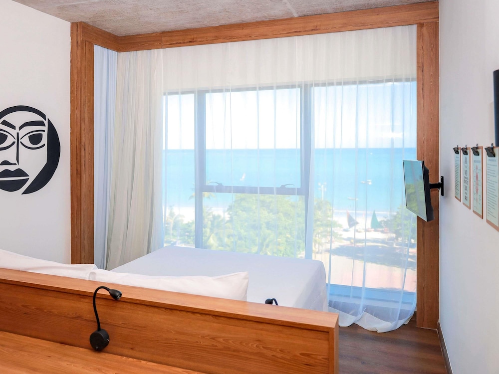 Habitación con 1 cama doble y vistas al mar del hotel Ibis Styles Maceió Pajuçara. Foto 2