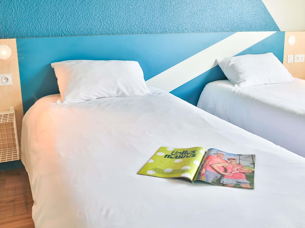 Habitación estándar con 2 camas individuales del hotel Ibis Budget Tours Sud. Foto 3