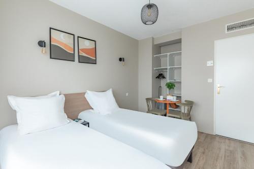 Estudio con 2 camas individuales del hotel Appart'city Classic Bordeaux Centre. Foto 1