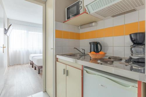 Estudio con 2 camas individuales del hotel Appart'city Classic Bordeaux Centre. Foto 2