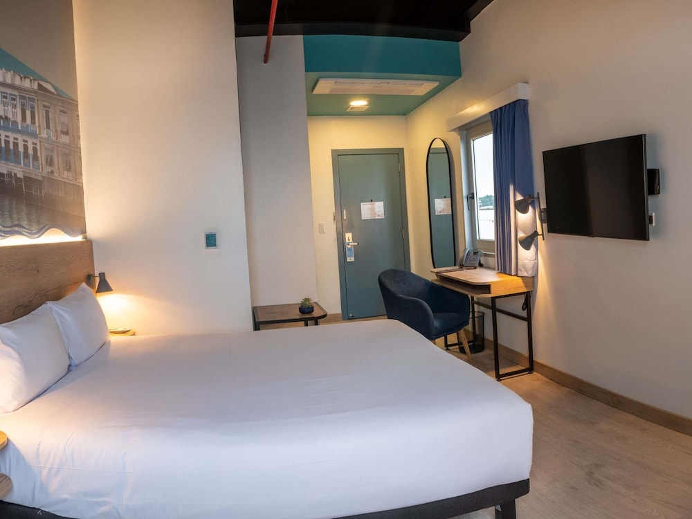 Habitación Deluxe, 1 cama doble con sofá cama del hotel Ibis Styles El Malecon Guayaquil. Foto 1