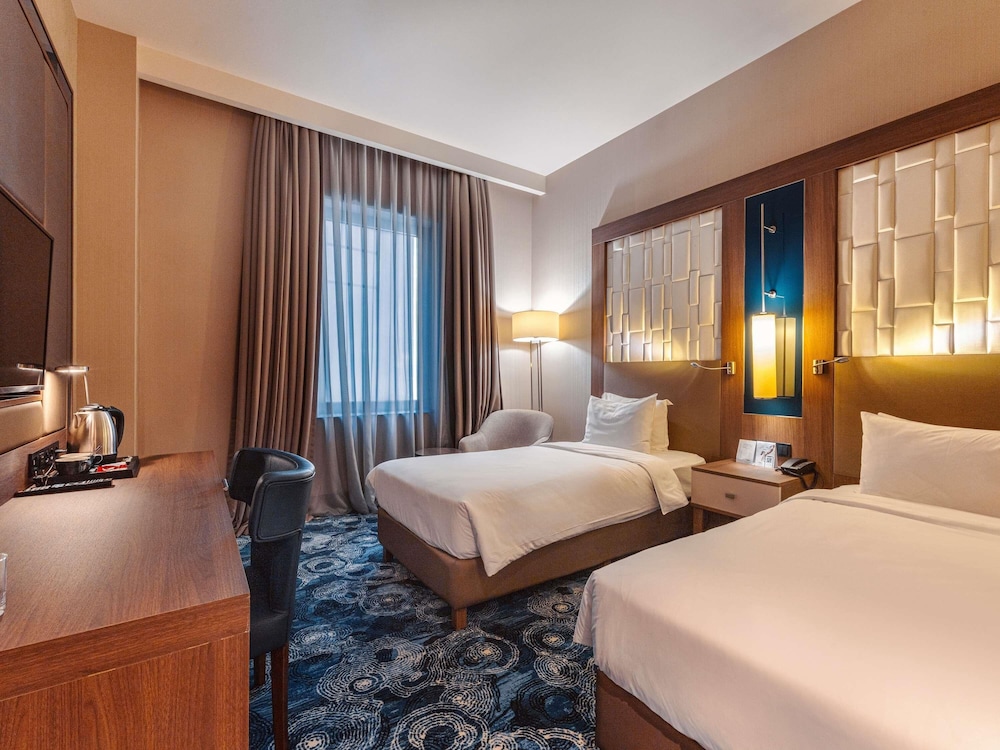 Habitación clásica con 2 camas individuales del hotel Tbilisi Philharmonic By Mercure