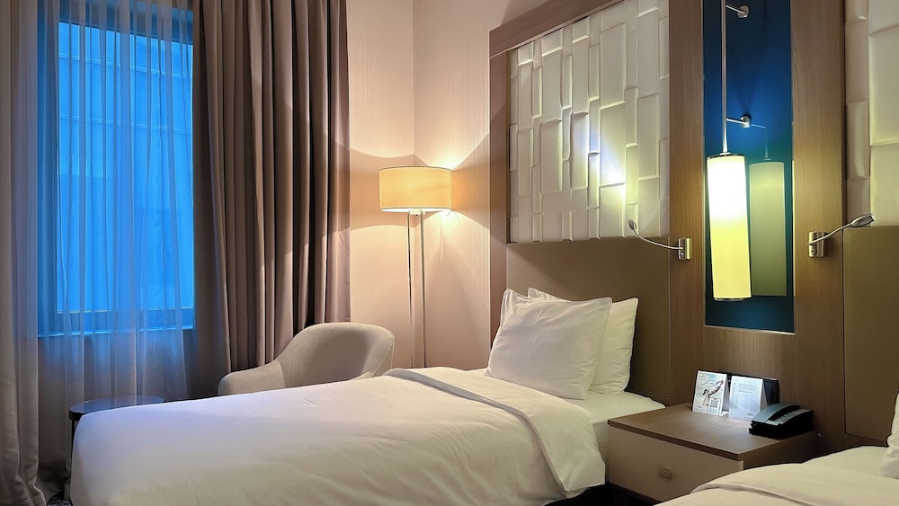 Habitación clásica con 2 camas individuales del hotel Tbilisi Philharmonic By Mercure. Foto 6
