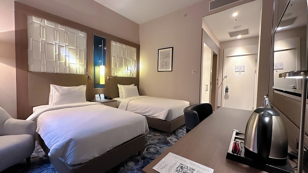 Habitación clásica con 2 camas individuales del hotel Tbilisi Philharmonic By Mercure. Foto 8