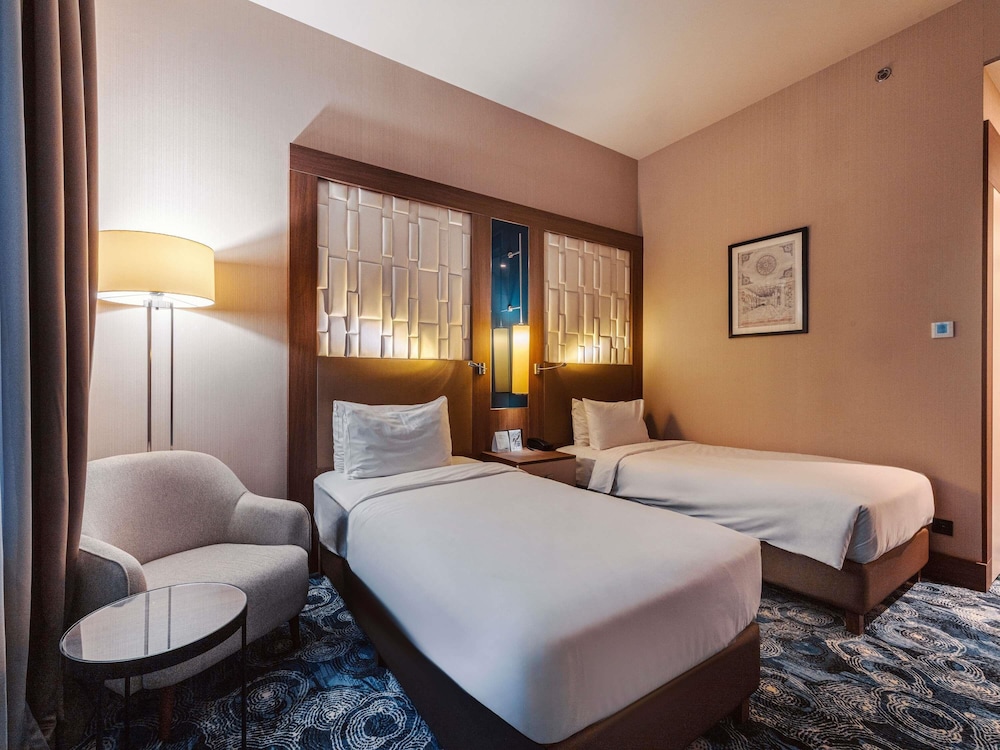 Habitación clásica con 2 camas individuales del hotel Tbilisi Philharmonic By Mercure. Foto 13