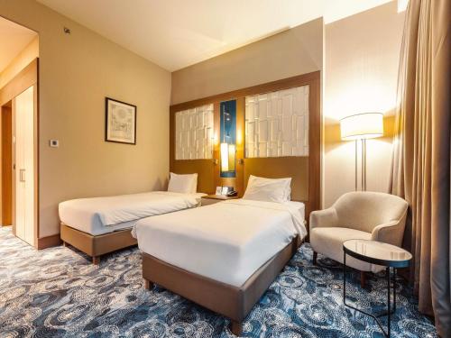 Habitación Estándar con 2 camas individuales, con balcón del hotel Tbilisi Philharmonic By Mercure. Foto 3