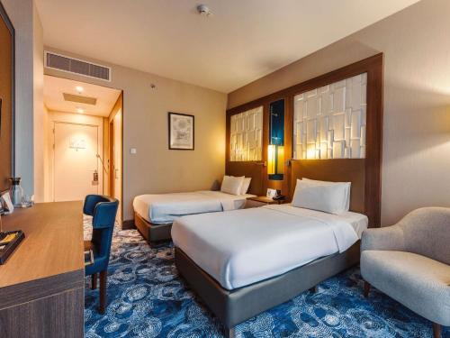 Habitación Estándar con 2 camas individuales, con balcón del hotel Tbilisi Philharmonic By Mercure. Foto 4