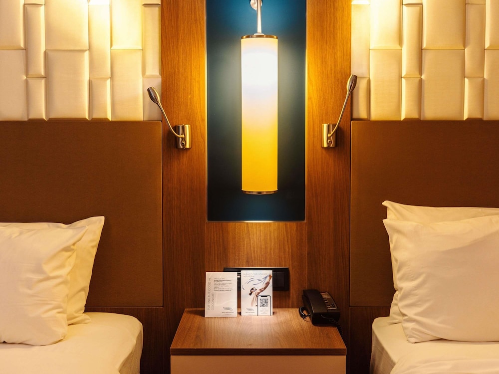 Habitación clásica con 2 camas individuales del hotel Tbilisi Philharmonic By Mercure. Foto 19