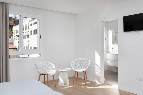 Habitación con vistas a la ciudad - 2 camas del hotel Boutique Maga. Foto 5