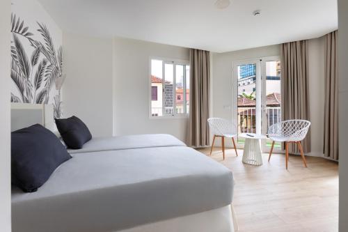 Habitación Doble con balcón del hotel Boutique Maga. Foto 4