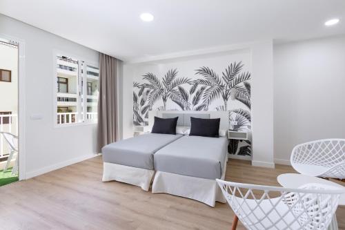 Habitación Doble con balcón del hotel Boutique Maga. Foto 6