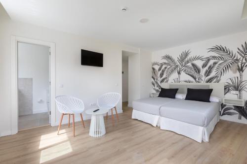 Habitación Doble con balcón del hotel Boutique Maga. Foto 7