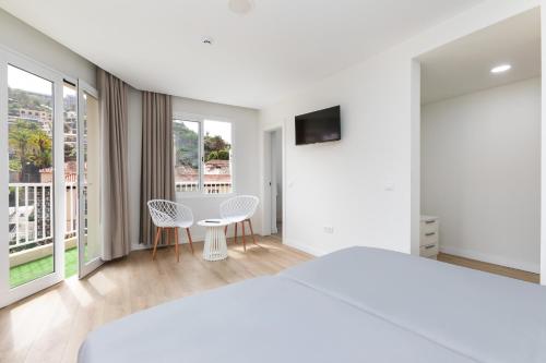 Habitación Doble con balcón del hotel Boutique Maga. Foto 5