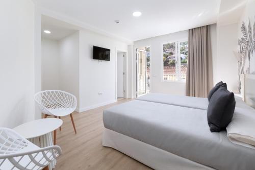 Habitación Doble con balcón del hotel Boutique Maga. Foto 9