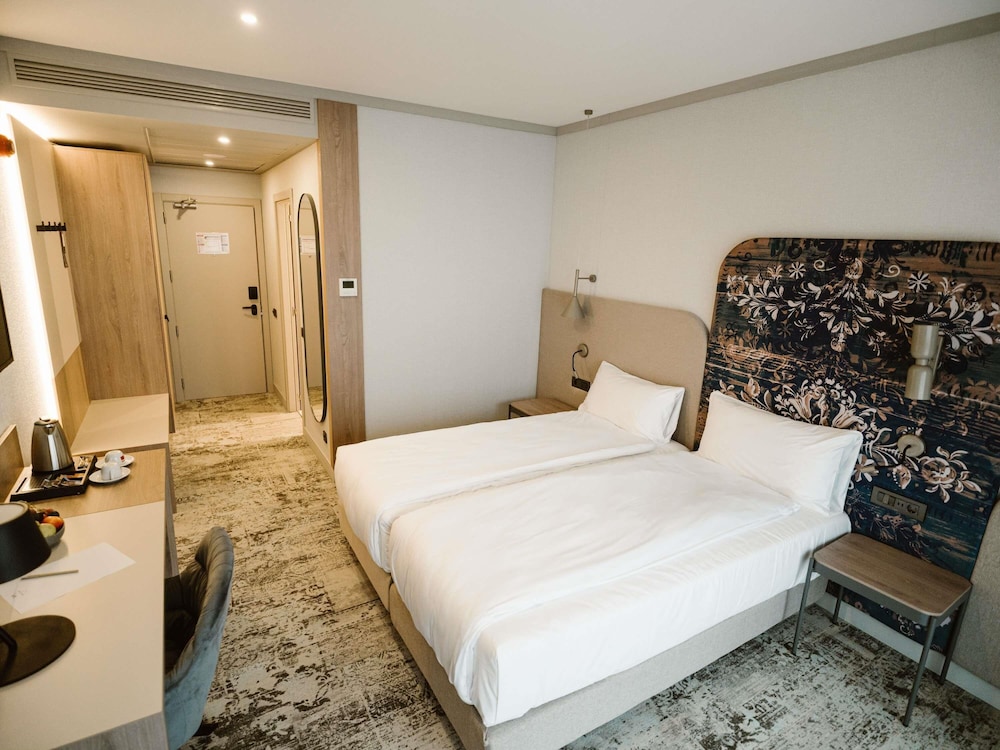 Habitación superior con 2 camas individuales del hotel Mercure Sibiu Arsenal