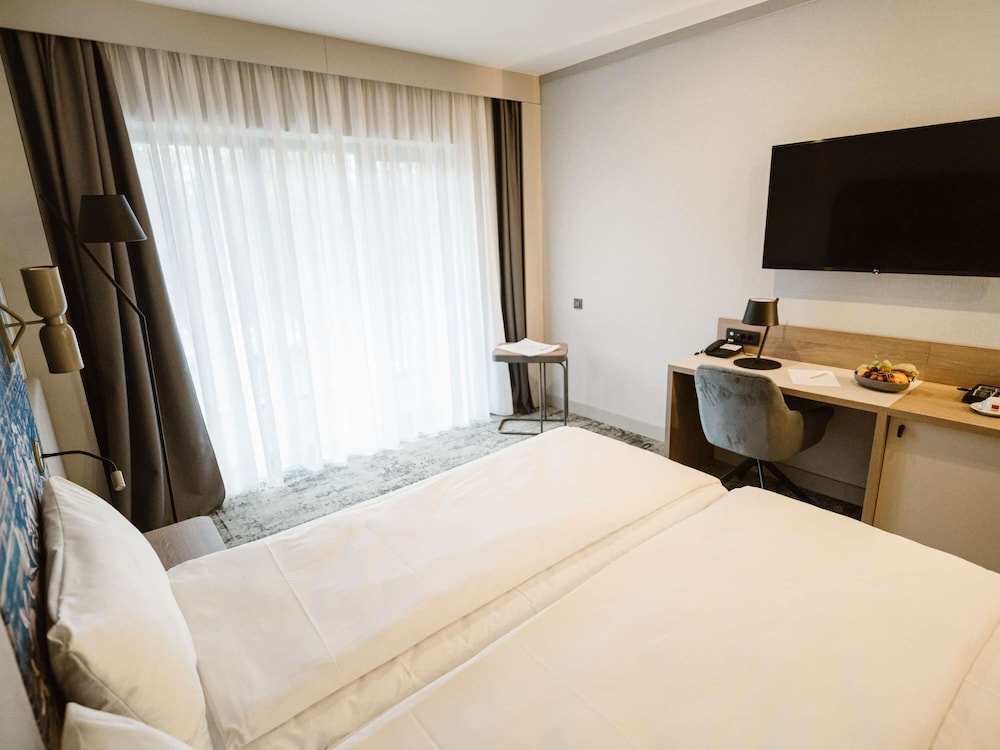 Habitación superior con 2 camas individuales del hotel Mercure Sibiu Arsenal. Foto 7