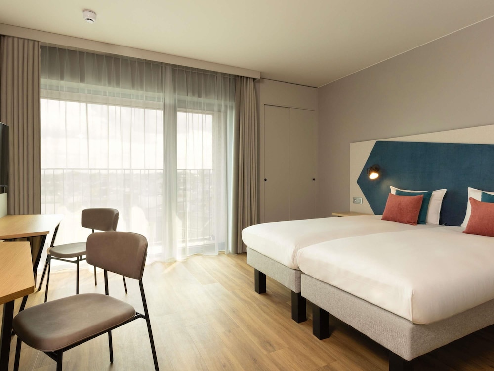 Estudio, 2 camas individuales del hotel Adagio Antwerp City Center. Foto 1
