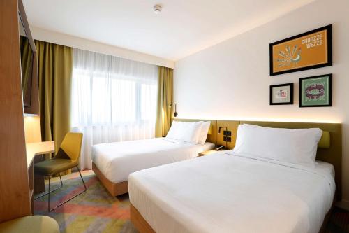 Habitación Doble - 2 camas del hotel Hampton By Hilton Krakow Airport. Foto 1