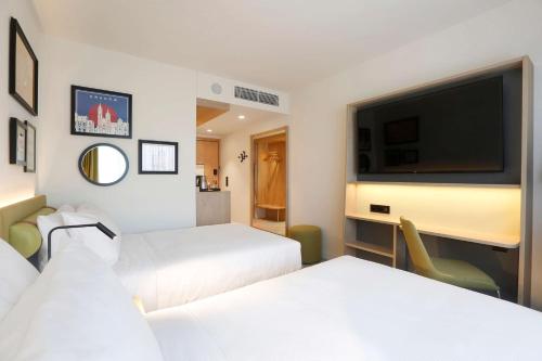 Habitación Doble - 2 camas del hotel Hampton By Hilton Krakow Airport. Foto 2