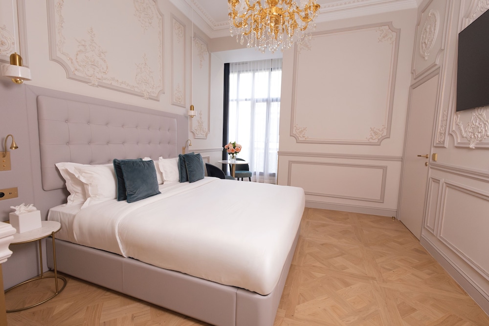 Habitación Deluxe del hotel Mode Paris Aparthotel. Foto 1