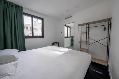 Habitación Doble con baño privado del hotel Beau M Paris - Hostel. Foto 1
