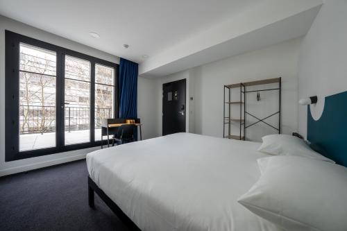 Habitación Doble con terraza del hotel Beau M Paris - Hostel. Foto 1