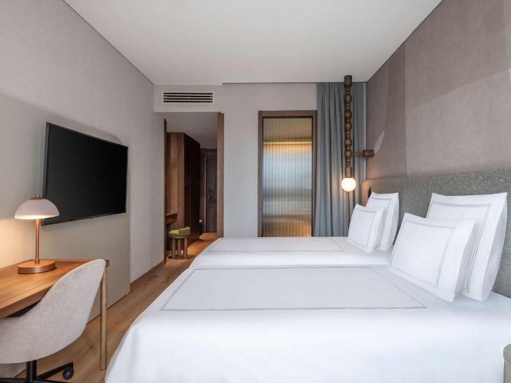 Swiss, Habitación Business con 2 camas individuales, 2 camas individuales del hotel Swissôtel Tbilisi. Foto 1