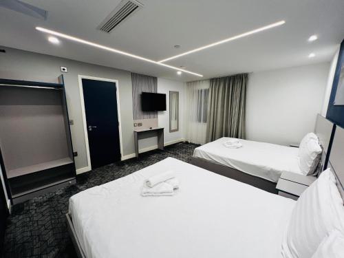 Habitación Cuádruple Deluxe del hotel Ilford Grand Hotel. Foto 1