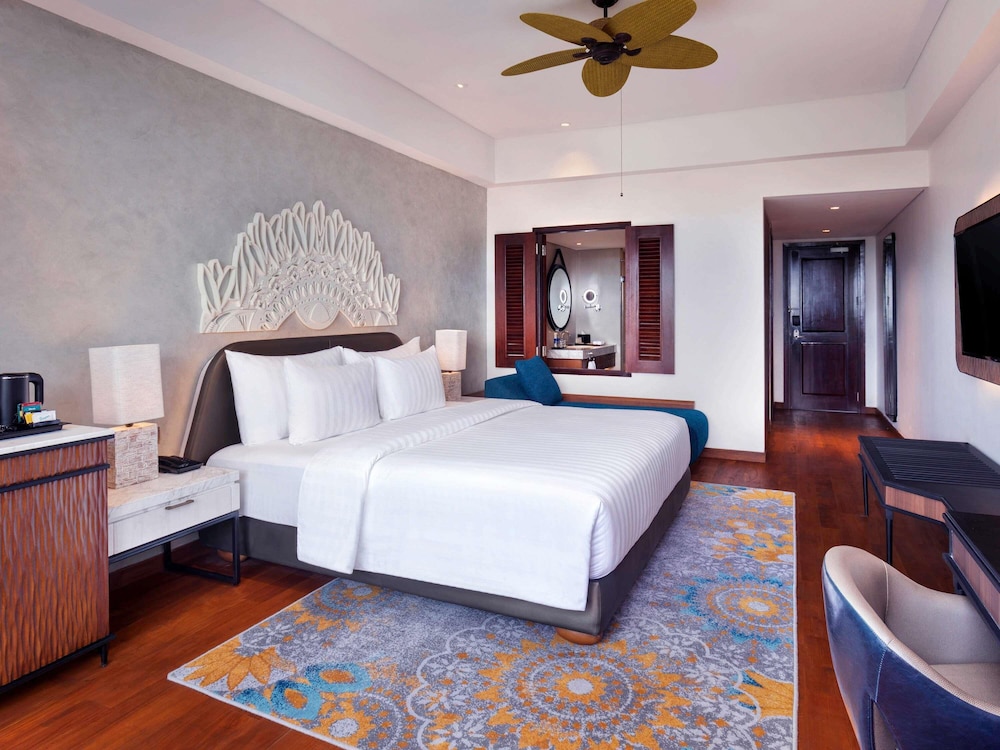 Habitación Deluxe con cama king size del hotel Grand Mercure Bali Seminyak. Foto 4