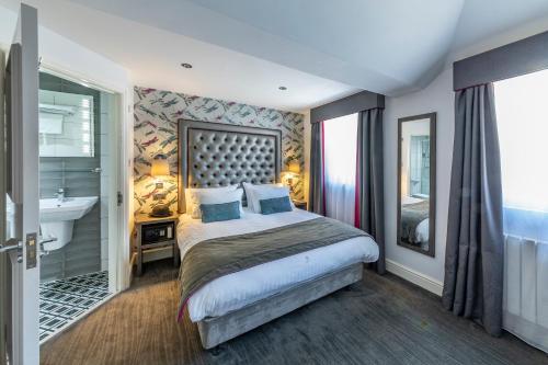 Habitación Doble Deluxe del hotel The Beverley Hotel. Foto 1