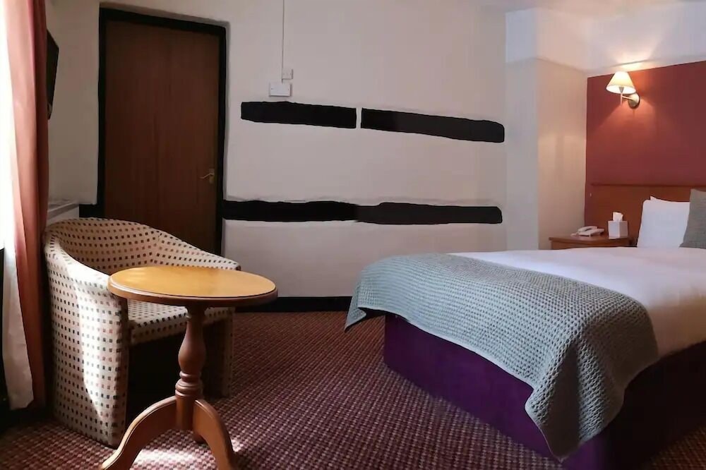 Habitación estándar doble del hotel The Tudor. Foto 1