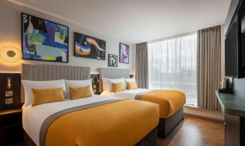 Habitación Doble Ejecutiva - 2 camas dobles del hotel Maldron Shoreditch London. Foto 5