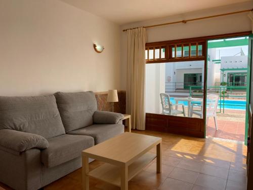 Apartamento de 1 dormitorio - Planta baja del hotel Las Palmeras. Foto 1