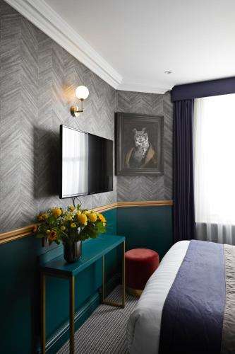 Habitación Doble Deluxe del hotel The Portico. Foto 4