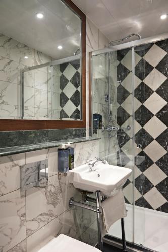 Habitación Individual Deluxe del hotel The Portico. Foto 5