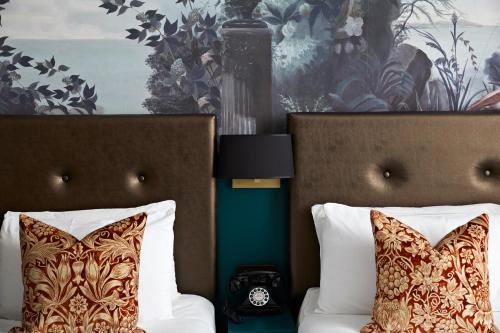 Habitación Cuádruple Deluxe del hotel The Portico. Foto 4