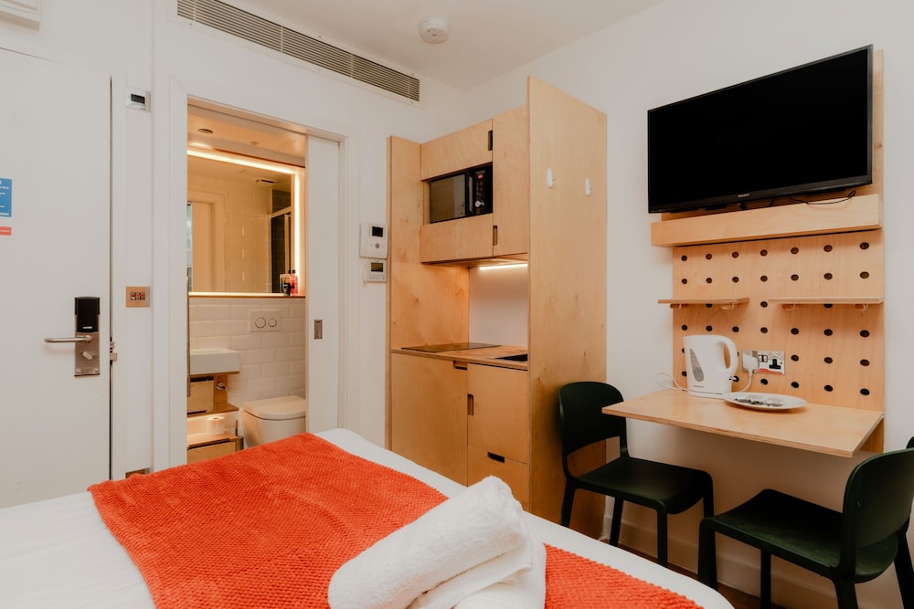 Estudio básico, baño privado del hotel Kensington Stay. Foto 6