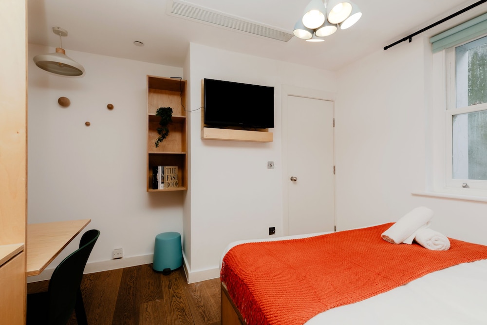 Estudio básico, baño privado del hotel Kensington Stay. Foto 9