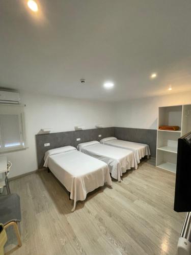 Habitación Triple del hotel Condedu Badajoz. Foto 1