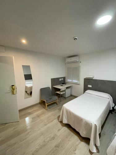 Habitación Triple del hotel Condedu Badajoz. Foto 2