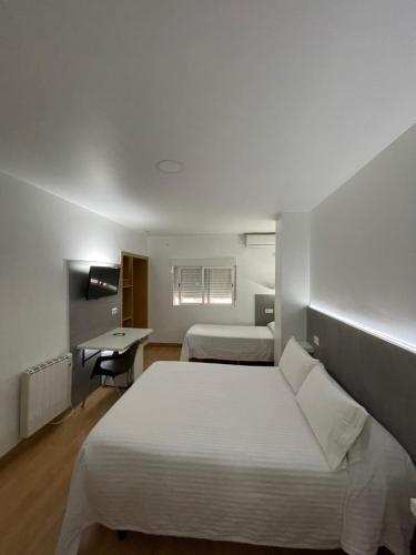 Habitación Triple del hotel Condedu Badajoz. Foto 7