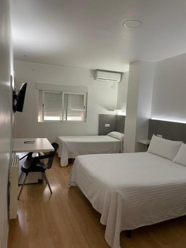 Habitación Triple del hotel Condedu Badajoz. Foto 8